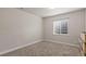 Bedroom featuring plush neutral carpets and a window at 17857 Lapis Ct, Monument, CO 80132