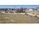 Community playground featuring a climbing structure, benches, and walking path with neighborhood views and mountain backdrop at 17857 Lapis Ct, Monument, CO 80132