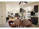 Open-concept living space featuring a modern kitchen, dining area, and comfortable living area at 645 Manhattan Pl # 106, Boulder, CO 80303