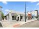 Charming commercial building showcasing striped awnings and street-front appeal with pedestrian access at 4539 Tennyson St # 105, Denver, CO 80212