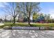 Cesar E. Chavez Park playground with a slide and playset in a green area at 4539 Tennyson St # 105, Denver, CO 80212
