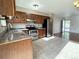Well-lit kitchen featuring stainless steel appliances and ample cabinet space at 4312 S Xenon St, Morrison, CO 80465