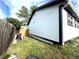 Side yard featuring a shed, partial privacy fence and partial metal wire fence, providing ample space for gardening at 4312 S Xenon St, Morrison, CO 80465