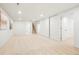 Large basement featuring stairs and sliding closet doors; space for flexible use at 9101 Clarkson St, Thornton, CO 80229