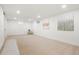 Expansive basement area with carpet and great lighting; ideal for entertainment or relaxation at 9101 Clarkson St, Thornton, CO 80229