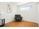 Cozy bedroom featuring natural light and a comfortable chair; a great reading space at 9101 Clarkson St, Thornton, CO 80229