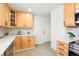 Modern kitchen featuring quartz countertops, subway tile backsplash, and ample cabinet space, designed for culinary enthusiasts at 9101 Clarkson St, Thornton, CO 80229
