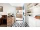 Stylish entryway with patterned tile flooring and built-in shelving at 2250 N Monaco Pkwy, Denver, CO 80207