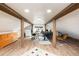 Large, light-filled office with wooden beams and several desks at 2250 N Monaco Pkwy, Denver, CO 80207