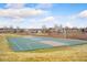 Outdoor basketball court for community residents on sunny day beneath blue sky at 20481 E Mansfield Pl, Aurora, CO 80013