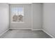 Bedroom featuring neutral walls, carpet, baseboard heating, and a window with blinds at 20481 E Mansfield Pl, Aurora, CO 80013