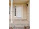 Inviting front entrance features a white door and updated hardware at 20481 E Mansfield Pl, Aurora, CO 80013