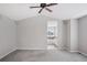 Large main bedroom with ceiling fan and ensuite bath at 20481 E Mansfield Pl, Aurora, CO 80013