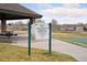Spring Creek Park playground enhancements sign with covered picnic area at 20481 E Mansfield Pl, Aurora, CO 80013