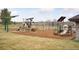 Community playground with slides, climbing structures, and swings for Gathering fun at 20481 E Mansfield Pl, Aurora, CO 80013