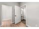 Modern half bathroom with a pedestal sink and stylish hexagon tile flooring at 14265 Currant St, Broomfield, CO 80020