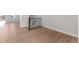 Living space with hardwood floors and railing to the next floor at 14265 Currant St, Broomfield, CO 80020