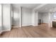 Spacious, open-concept living area featuring wood floors and natural light at 14265 Currant St, Broomfield, CO 80020