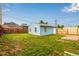 Backyard showing a small storage building and a wooden fence at 5001 W Nevada Pl, Denver, CO 80219