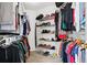 Walk-in closet with organized shelves and racks providing ample storage for clothing and accessories at 12942 Leyden St, Thornton, CO 80602