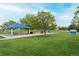 Community park featuring a covered picnic area and playground equipment at 12942 Leyden St, Thornton, CO 80602