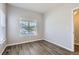 Bright bedroom with natural light, and neutral paint that offers a blank canvas for personalization at 7933 Florado St, Denver, CO 80221