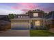 Charming home featuring a well-manicured lawn and a spacious two-car garage, perfect for suburban living at 7933 Florado St, Denver, CO 80221