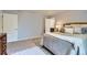 Comfortable main bedroom with connecting ensuite bathroom and neutral paint that's a blank canvas at 7933 Florado St, Denver, CO 80221