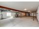 Spacious unfinished basement with utilities, concrete floor, insulated walls, and a window at 65960 E Evans Pl, Byers, CO 80103
