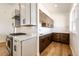 This spacious kitchen includes modern appliances, granite countertops, and lots of cabinet space at 65960 E Evans Pl, Byers, CO 80103