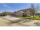 Charming home featuring an attached two-car garage, well-maintained lawn, and inviting curb appeal at 7774 S Biloxi Way, Aurora, CO 80016
