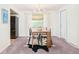 Light dining room featuring modern table and chairs, and natural light at 85 S Flower St, Lakewood, CO 80226