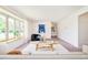 Spacious living room showcasing contemporary decor, large windows, and cozy seating at 85 S Flower St, Lakewood, CO 80226