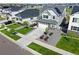 An aerial view of a beautifully landscaped home in a well-planned community at 7166 S Vandriver Way, Aurora, CO 80016
