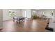 Open recreation area featuring plank flooring, recessed lighting, ping pong table, and seating at 7166 S Vandriver Way, Aurora, CO 80016