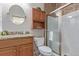 Bathroom features granite countertops and a glass enclosed shower at 1162 Rockhurst Dr # 404, Highlands Ranch, CO 80129