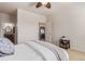 Main bedroom with ensuite bathroom and view to kitchen at 1162 Rockhurst Dr # 404, Highlands Ranch, CO 80129