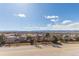 Wide neighborhood view from the balcony, showcasing landscape and clear skies at 1162 Rockhurst Dr # 404, Highlands Ranch, CO 80129