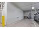 Clean and secure parking garage featuring a gated storage area and designated parking spot at 1162 Rockhurst Dr # 404, Highlands Ranch, CO 80129