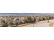 Street view overlooking homes and distant mountains at 1162 Rockhurst Dr # 404, Highlands Ranch, CO 80129