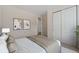 Serene bedroom featuring plush bedding, stylish decor, and ample closet space for optimal storage at 311 Josef Cir, Fort Lupton, CO 80621