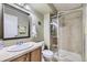 Clean bathroom with a shower and tiled floor at 592 Bristolwood Ln, Castle Pines, CO 80108