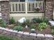 Landscaped front yard with stone border at 592 Bristolwood Ln, Castle Pines, CO 80108