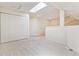 Loft area with natural light, plush carpet, storage closet, and access to additional rooms at 2330 S Salem Cir, Aurora, CO 80014