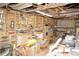 The workshop area features lots of storage and work space, ideal for DIY projects and hobbies at 3901 S Washington St, Englewood, CO 80113