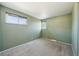 Neutral bedroom with carpeted floors and two windows for natural light at 4080 E Caley Cir, Centennial, CO 80121