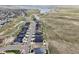Aerial view of a new residential community with modern homes and scenic surroundings at 6980 S Yantley Ct, Aurora, CO 80016