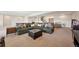 Large finished basement featuring a comfortable seating area, and ample space at 6980 S Yantley Ct, Aurora, CO 80016
