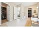 A Primary bathroom offers dual walk-in closets, a private water closet, and access to the main bedroom at 6980 S Yantley Ct, Aurora, CO 80016
