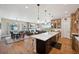 Open concept kitchen and living room layout is perfect for entertaining and Gathering gatherings at 6980 S Yantley Ct, Aurora, CO 80016